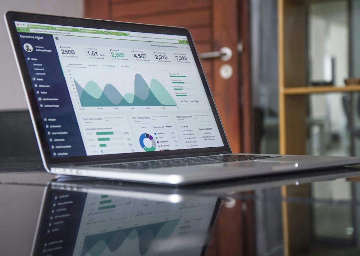 Laptop showing a data dashboard slide